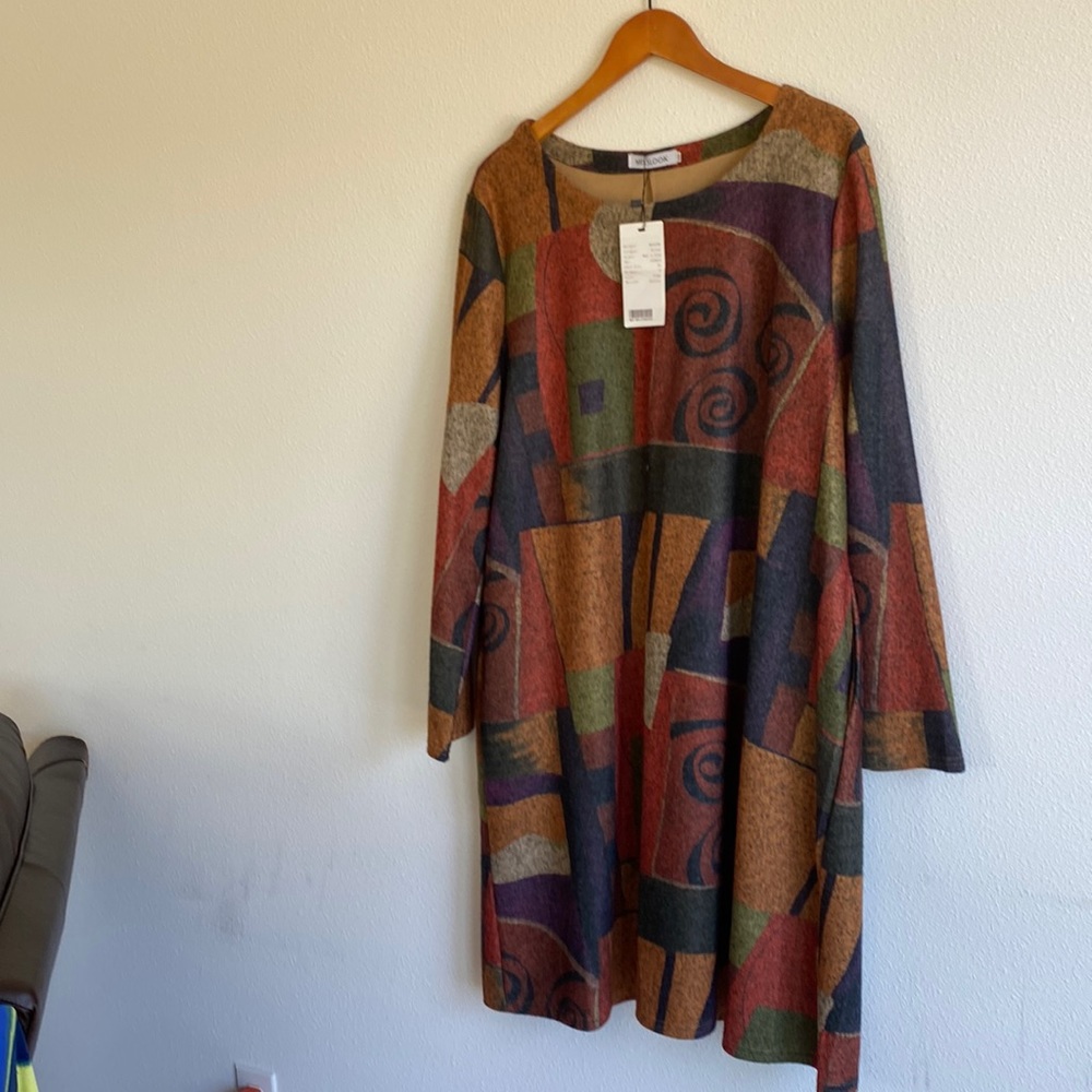 Comfortable midi dress. New with tag.